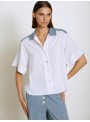 Blusa Skatie, de distintos tejidos en blanco y azul. S05B82