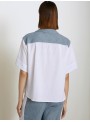 Blusa Skatie, de distintos tejidos en blanco y azul. S05B82