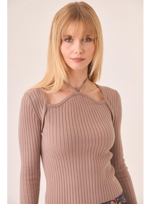 Sueter Nekane, de canalè fino. Taffe