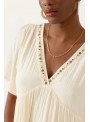 Vestido Art Love, vaporoso en beige. Delaine