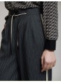 Pantalòn Skatie, de rayas en gris. S202P06