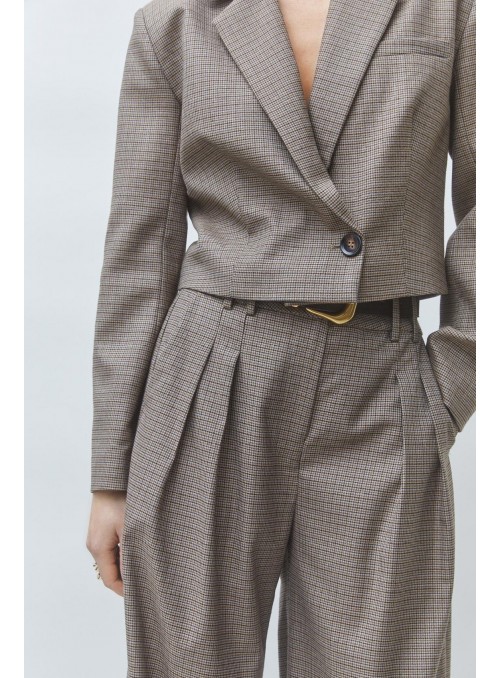 Pantalòn de Suncoo, de cuadros en beige. Junior